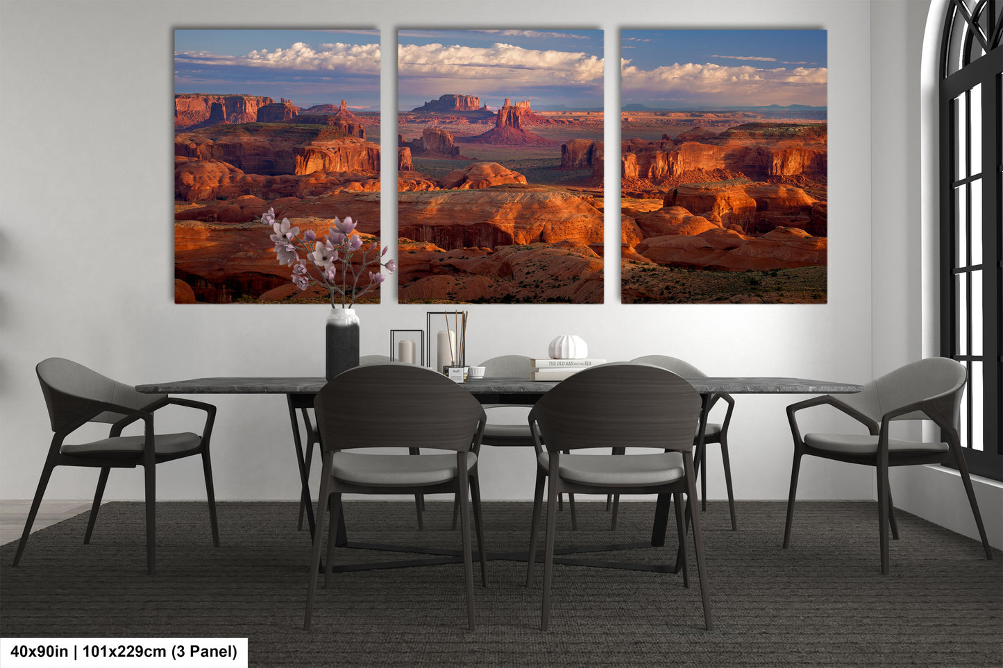 a dining room with a table and chairs