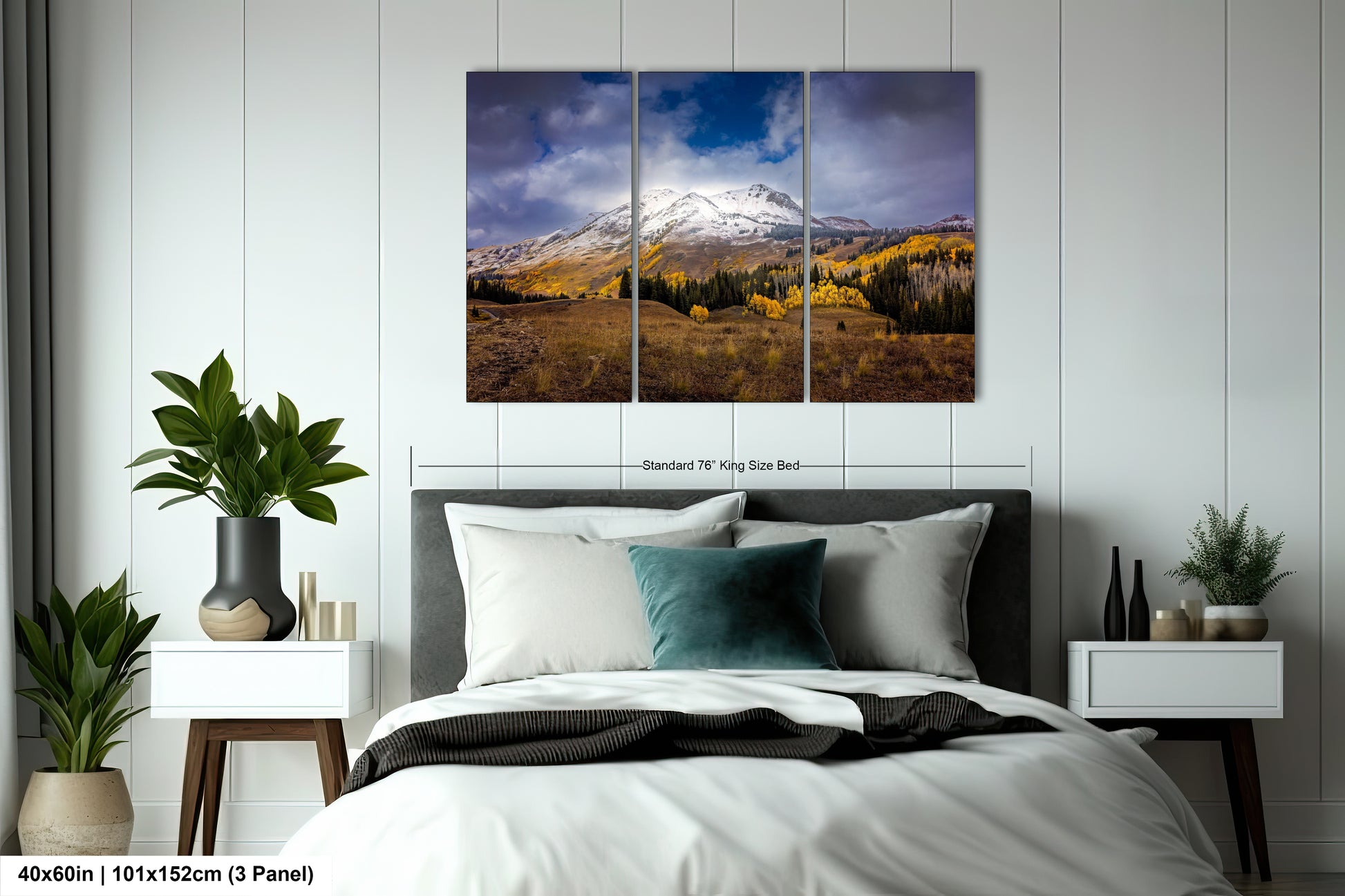 a bed room with a neatly made bed and a painting on the wall