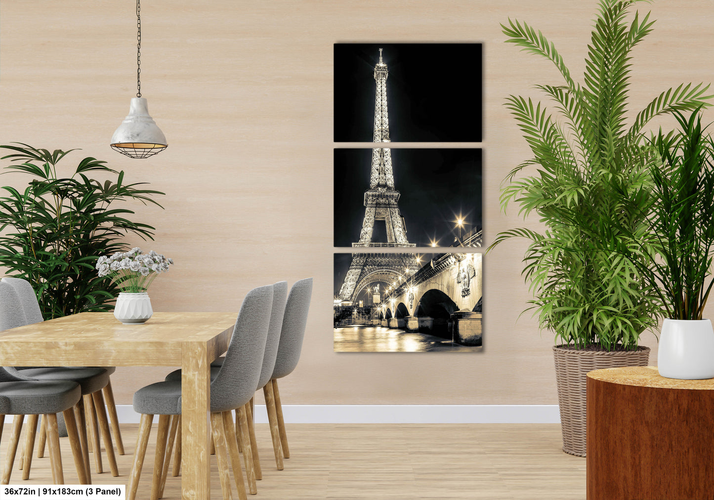 a room with a table and chairs and a picture of the eiffel tower