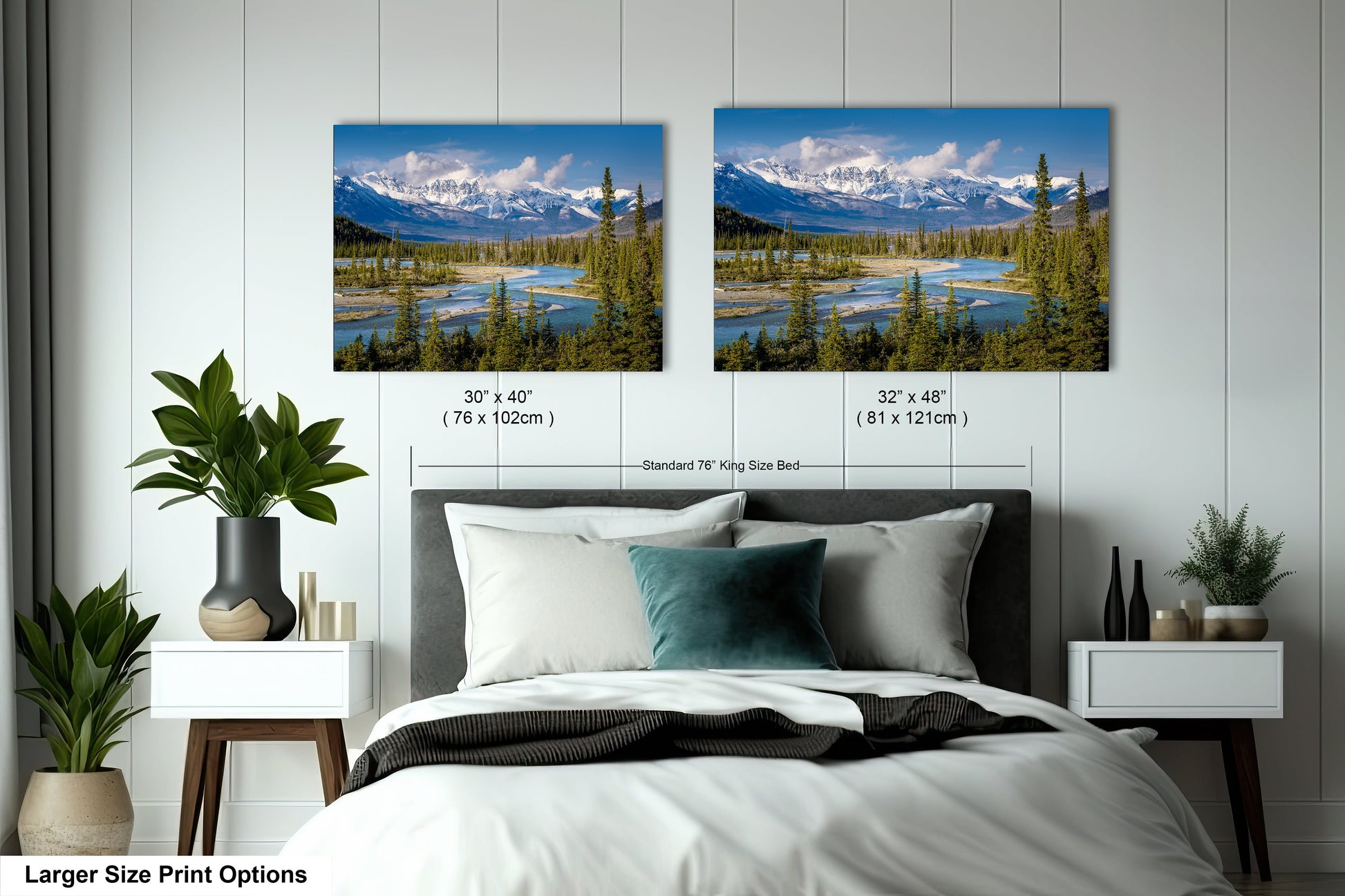 a bedroom with a bed and two pictures on the wall