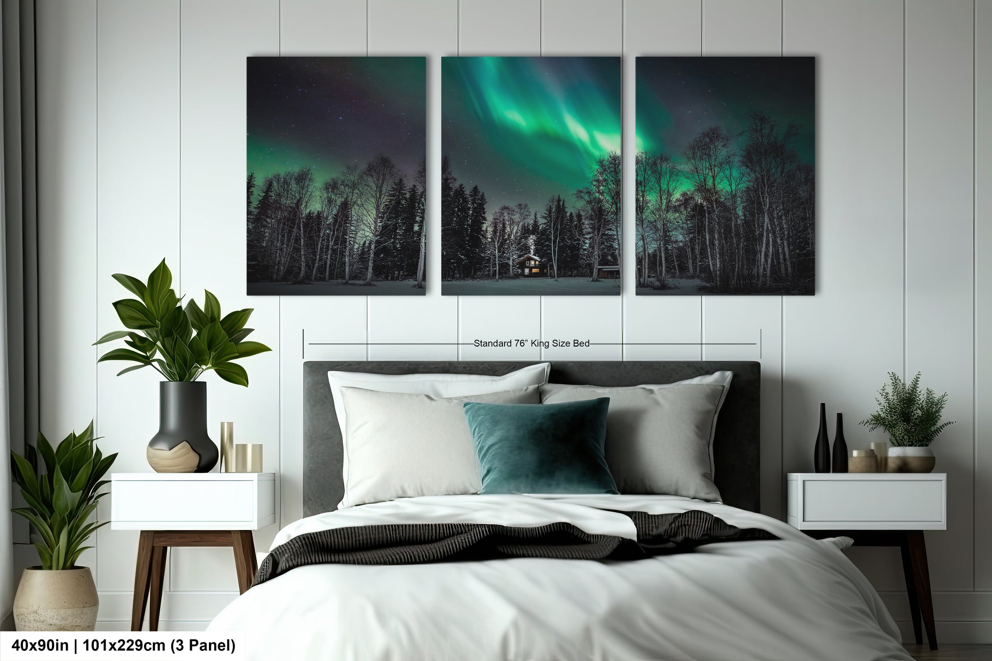 a bedroom with a bed and two paintings on the wall