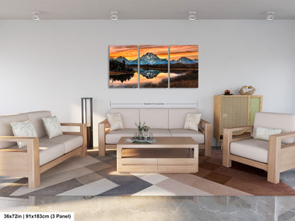 a living room filled with furniture and a painting on the wall