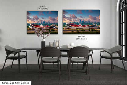a dining room table with chairs and a vase of flowers