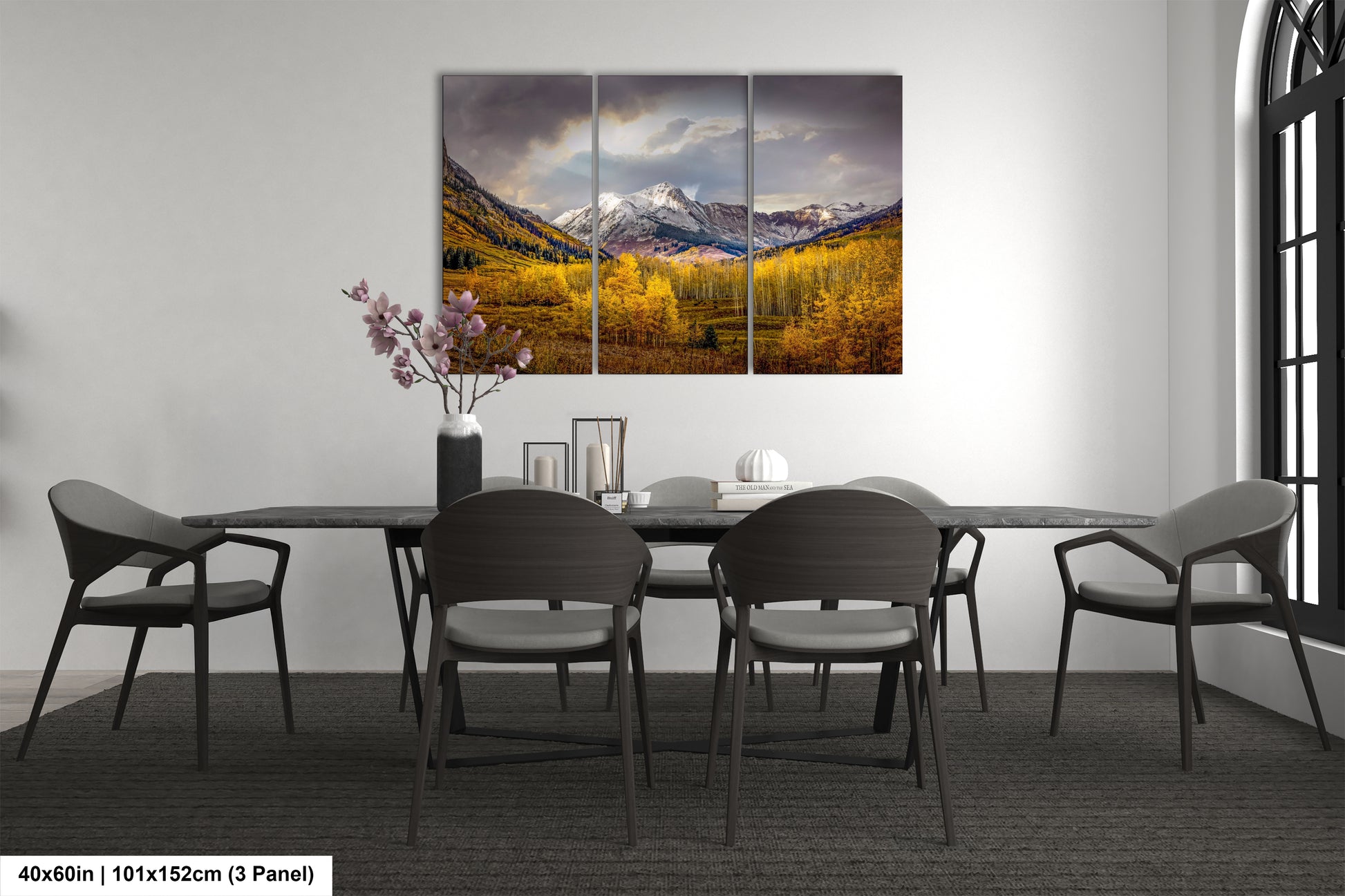 a dining room with a table and chairs