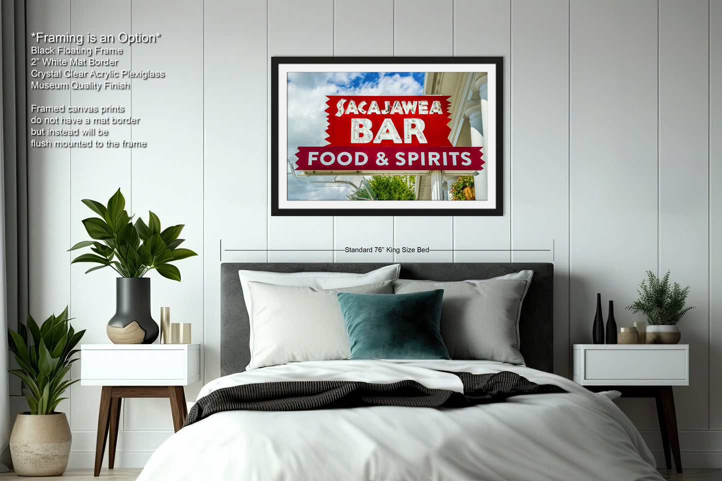 a bedroom with a bed and a poster on the wall