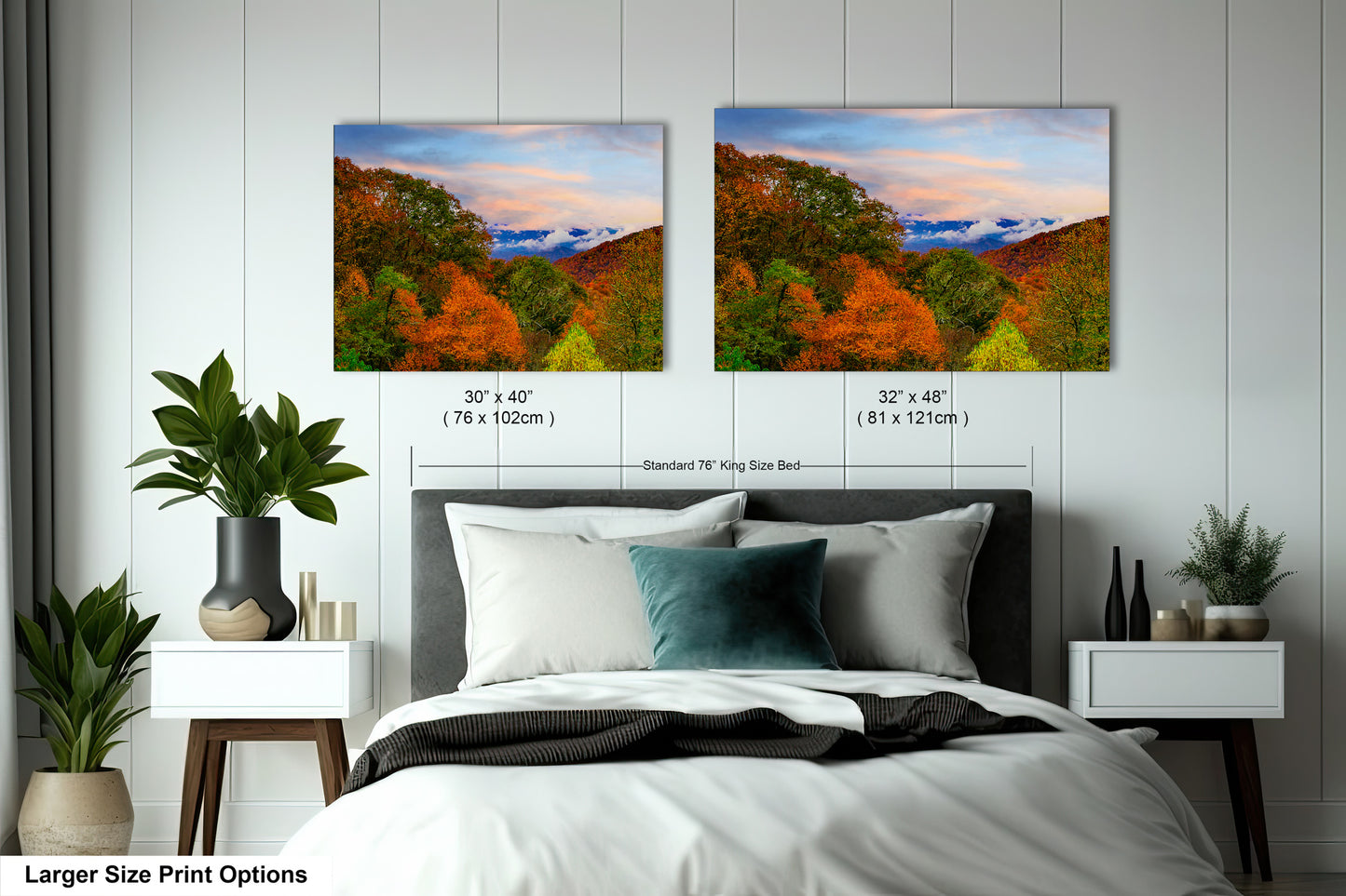 a bedroom with a bed and two pictures on the wall