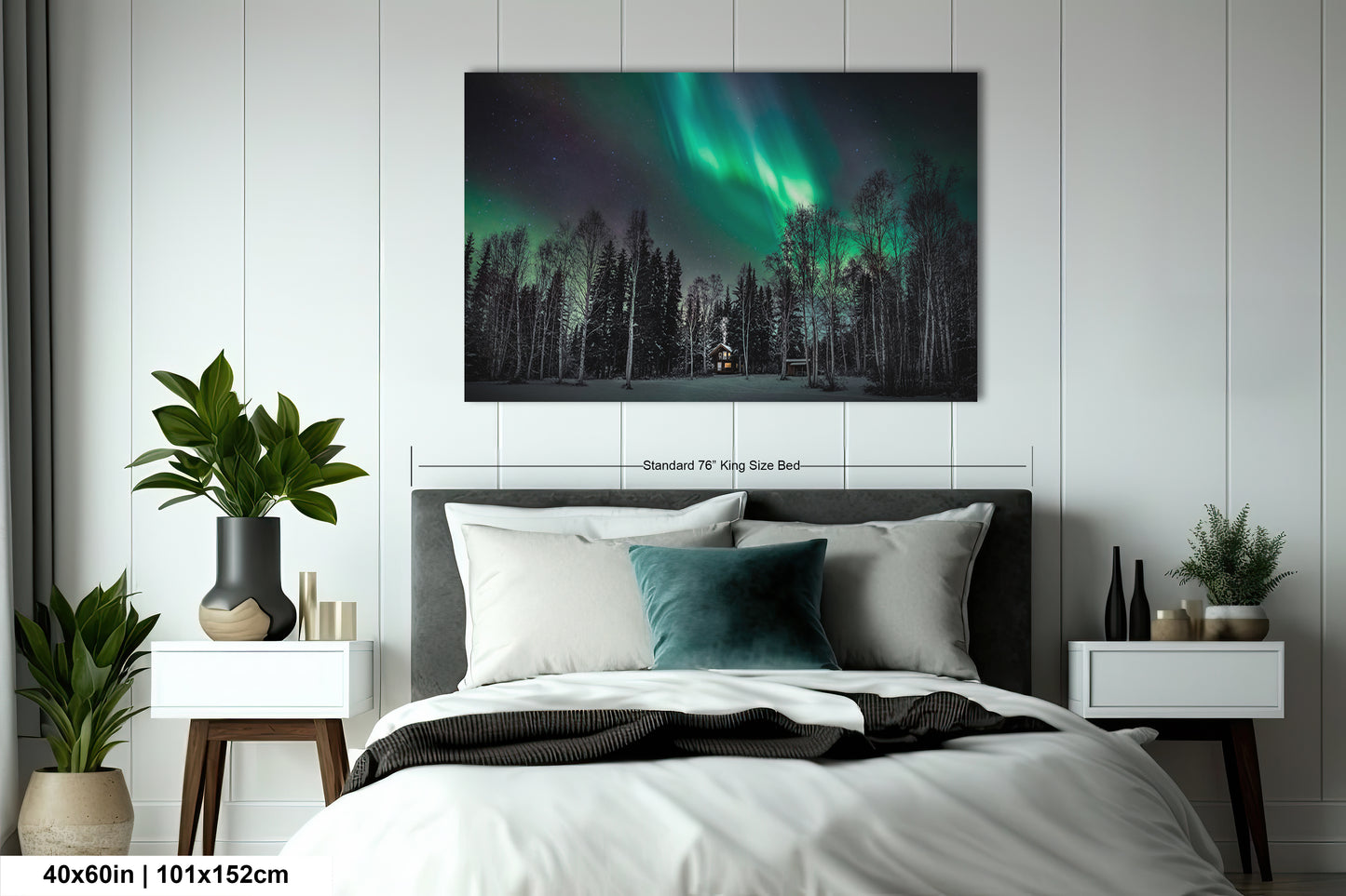 a bed room with a neatly made bed and a painting on the wall