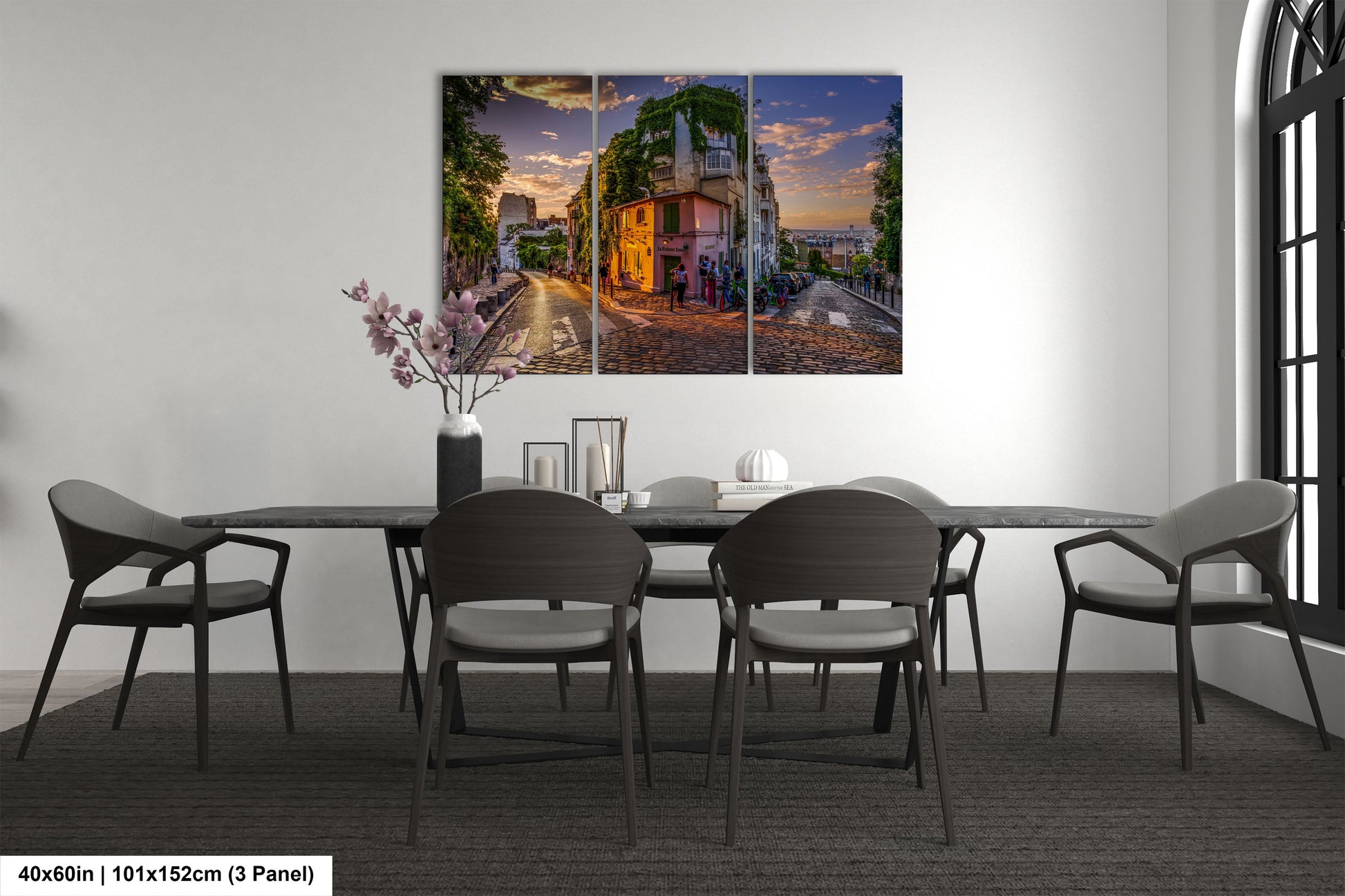 a dining room with a table and chairs