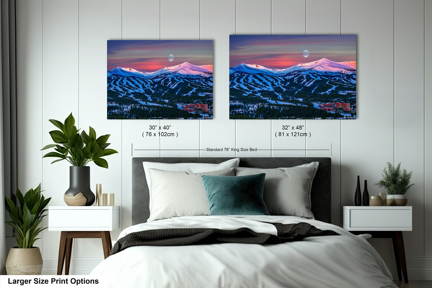 a bedroom with a bed and two pictures on the wall