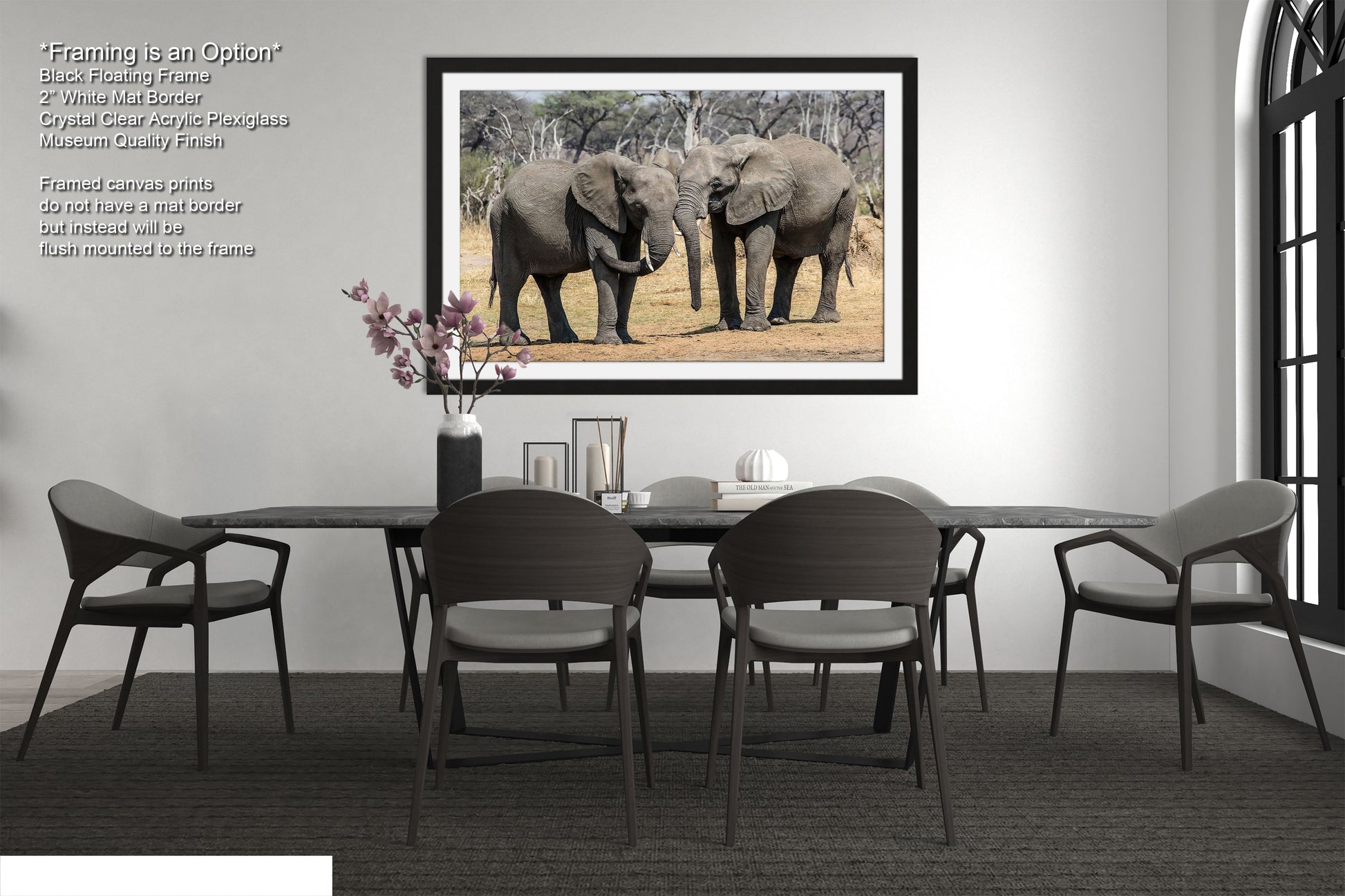 a picture of two elephants in a dining room