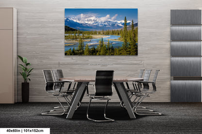 a dining room with a table and chairs