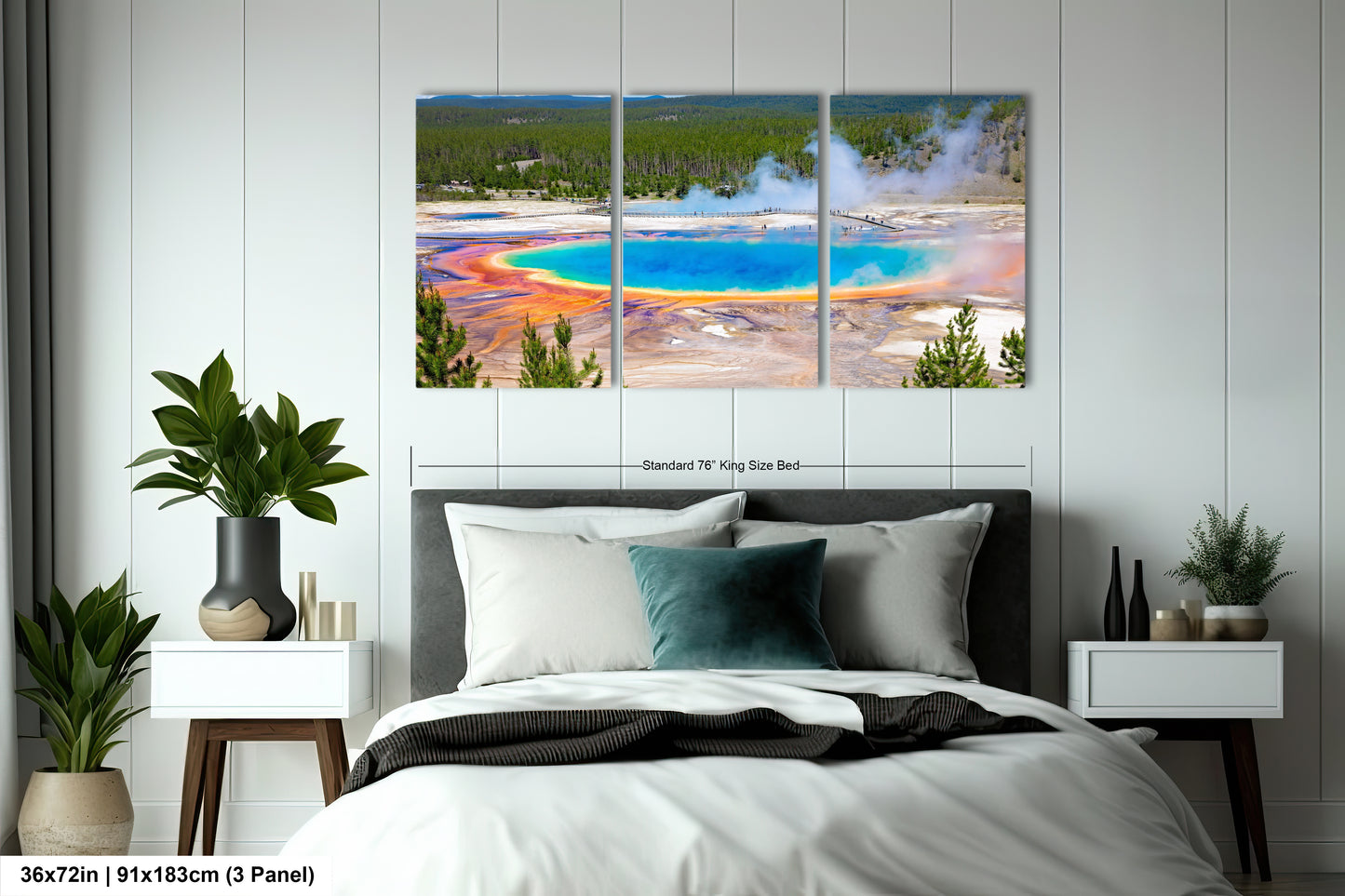 a bedroom with a bed and two paintings on the wall