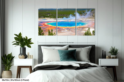 a bedroom with a bed and two paintings on the wall