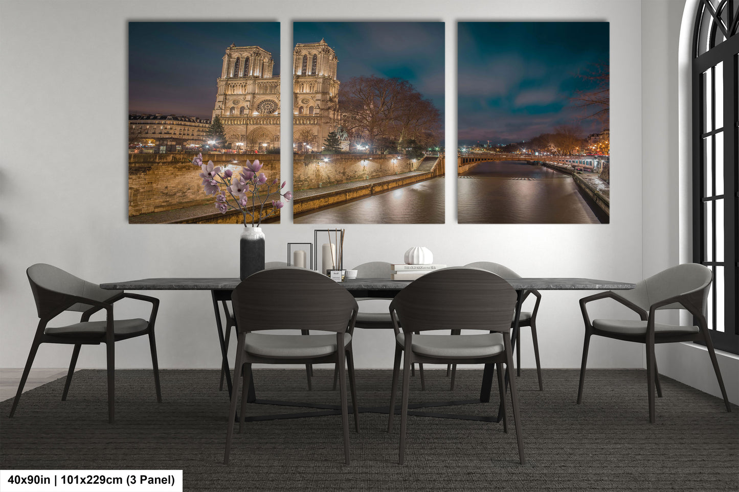 a dining room with a table and chairs