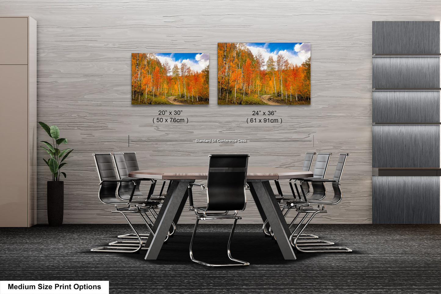 a dining room table with chairs next to a wall with a picture of a forest
