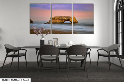 a dining room with a table and chairs