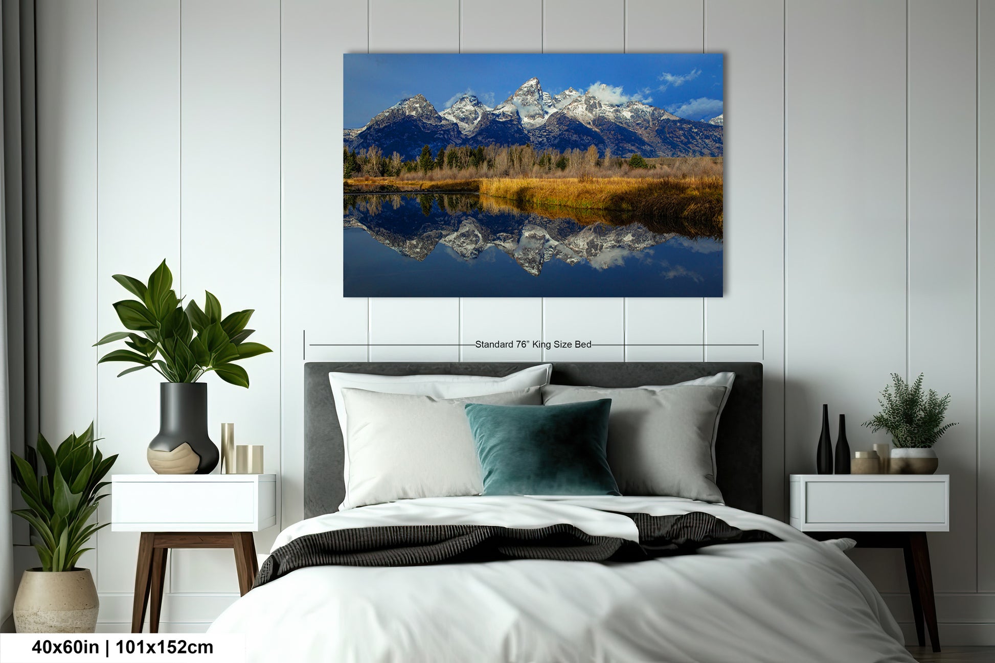 a bedroom with a bed and a painting on the wall