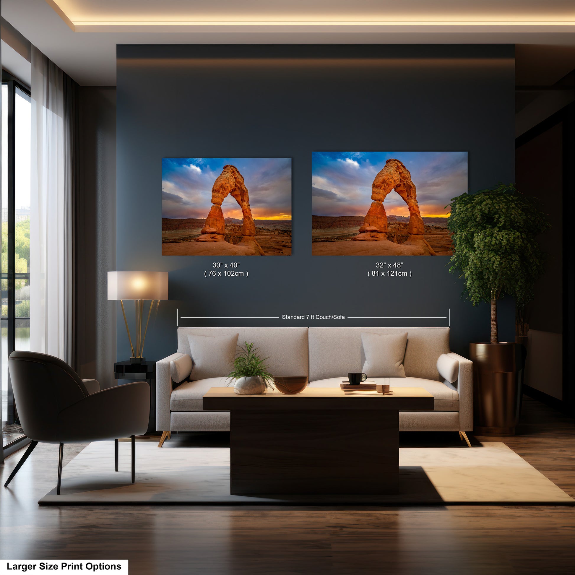 a living room with a couch and two pictures on the wall