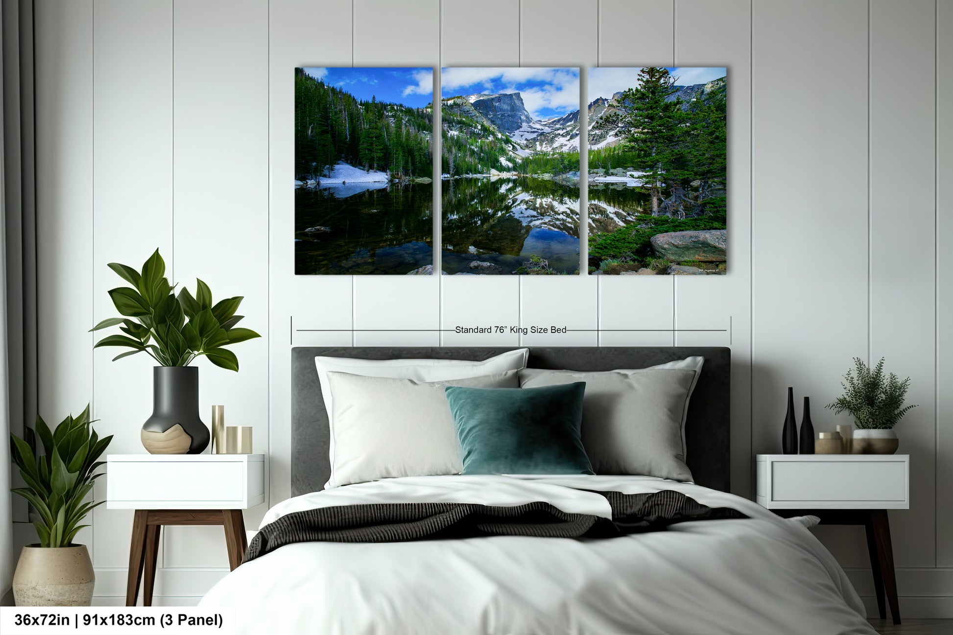 a bedroom scene with a bed and a wall hanging