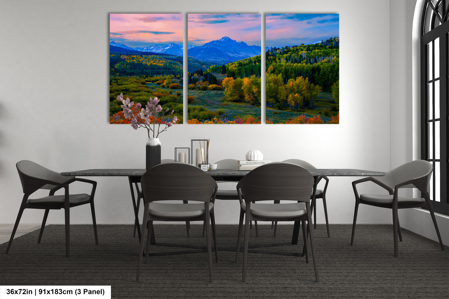 a dining room with a table and four chairs