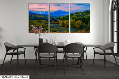 a dining room with a table and four chairs