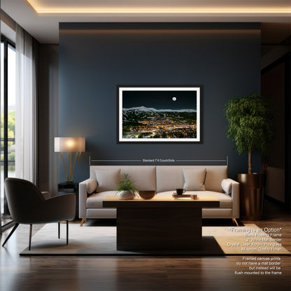a living room filled with furniture and a painting on the wall