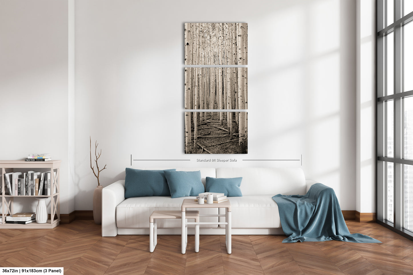 a living room with a white couch and wooden floors