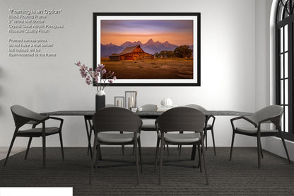a dining room with a table and chairs