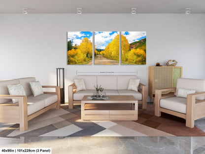 a living room filled with furniture and a painting on the wall