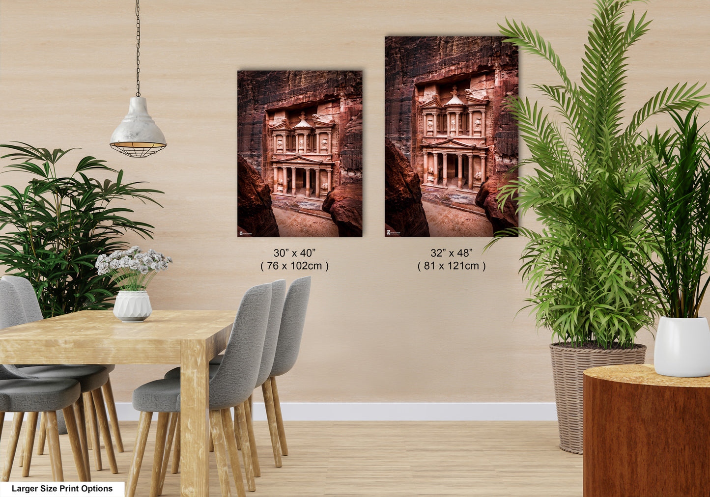 a dining room with a table and chairs next to a potted plant