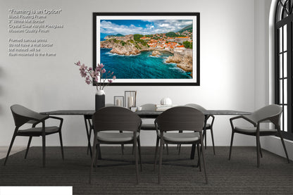 a picture of a dining room with a table and chairs