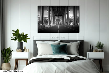 a black and white photo of a bed in a bedroom