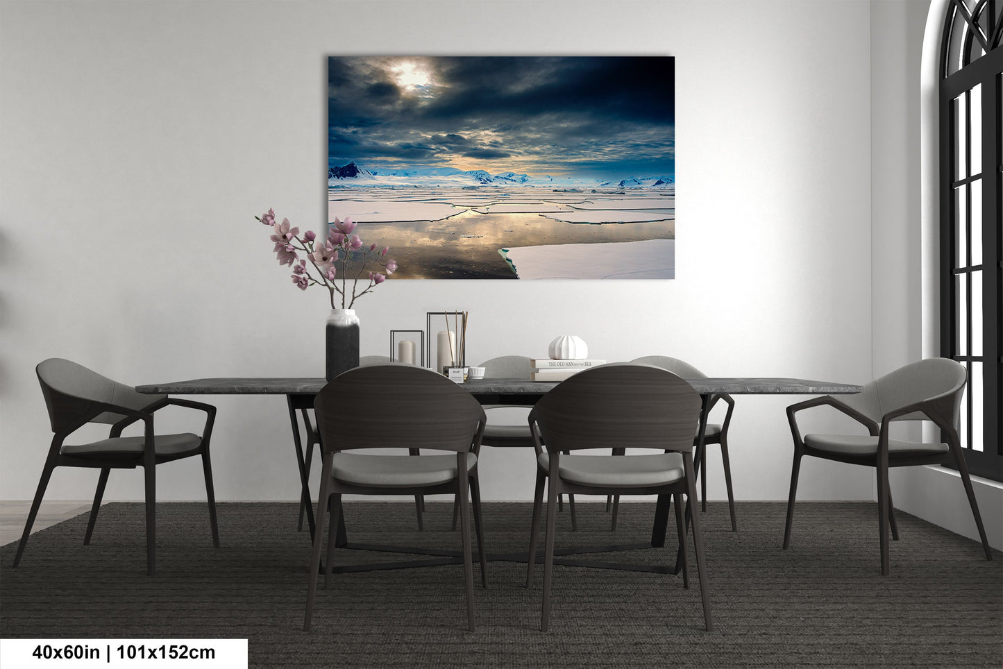 a dining room with a table and chairs