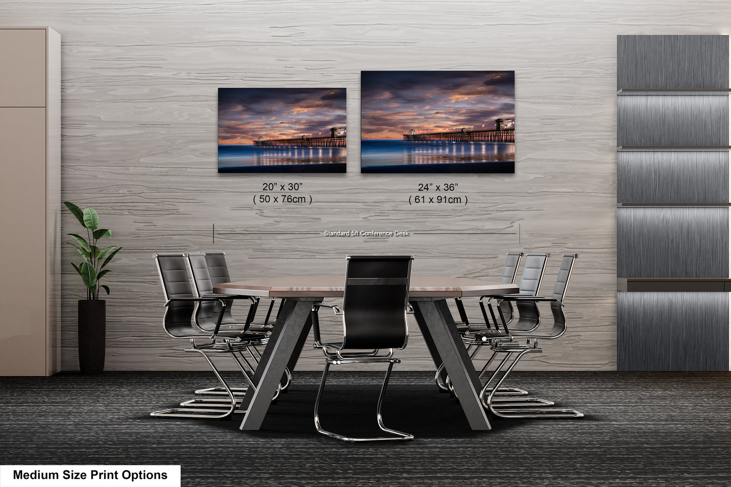 a dining room table with chairs and two pictures on the wall