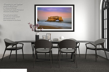a picture of a dining room with a table and chairs