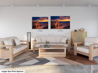 a living room filled with furniture and a painting on the wall