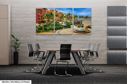 a dining room table with chairs and a painting on the wall