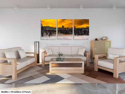 a living room filled with furniture and a painting on the wall