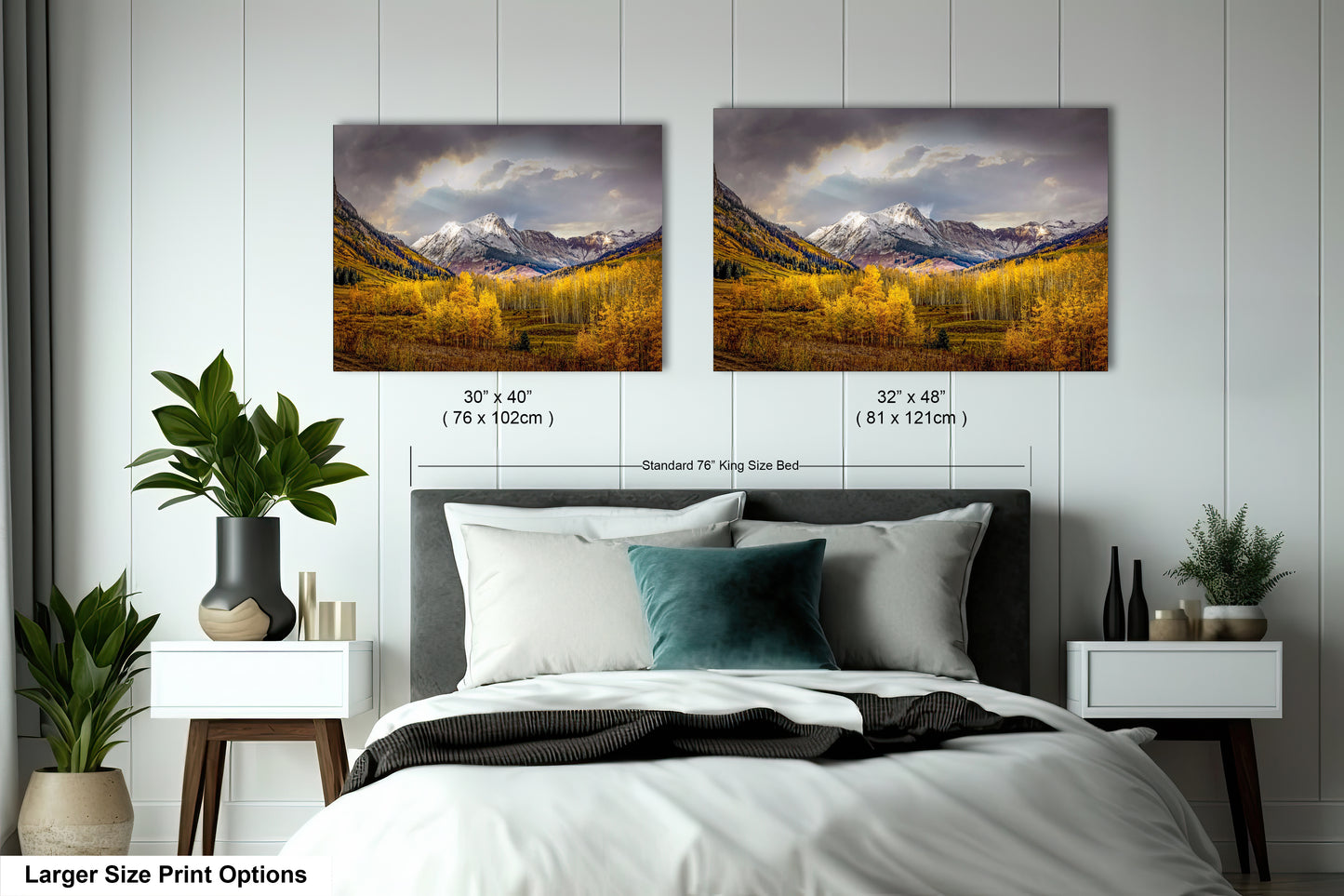 a bedroom with a bed and two pictures on the wall