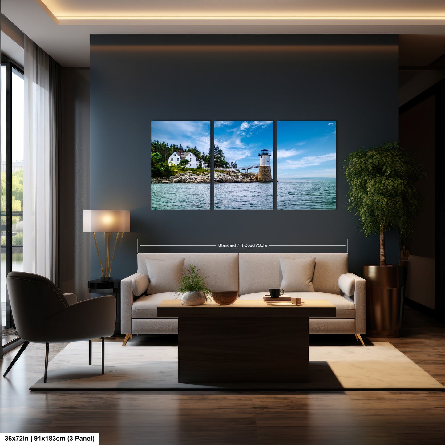 a living room with a couch and two pictures on the wall