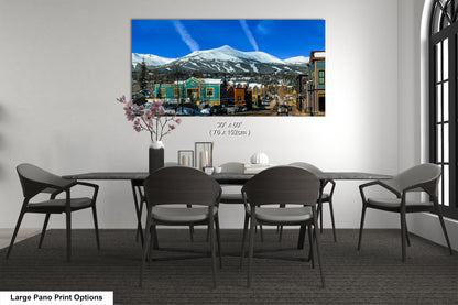 a dining room with a table and chairs