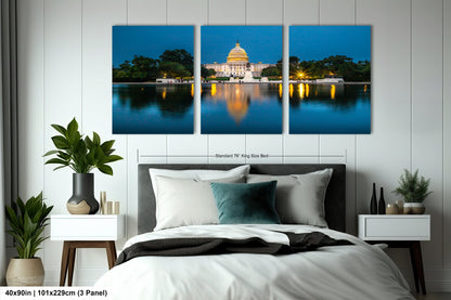 a bedroom scene with focus on the bed and the capitol building in the background
