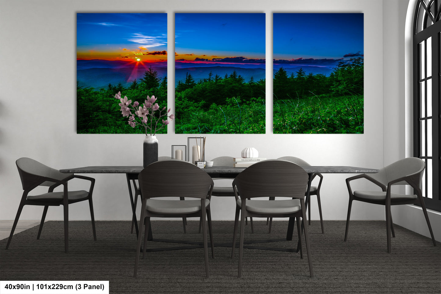 a dining room with a table and four chairs