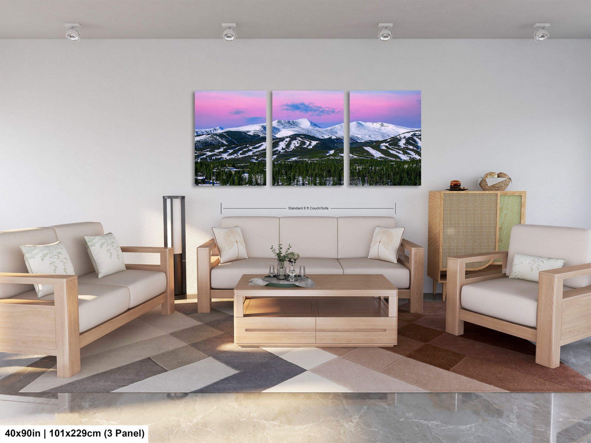 a living room filled with furniture and a painting on the wall