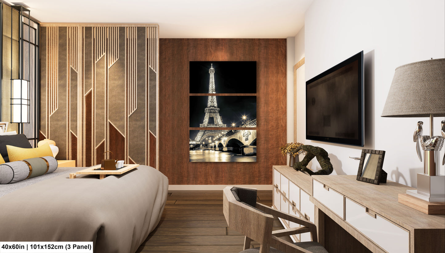a hotel room with a bed, desk and television