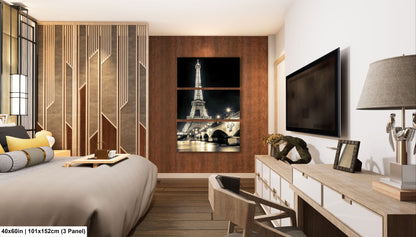 a hotel room with a bed, desk and television