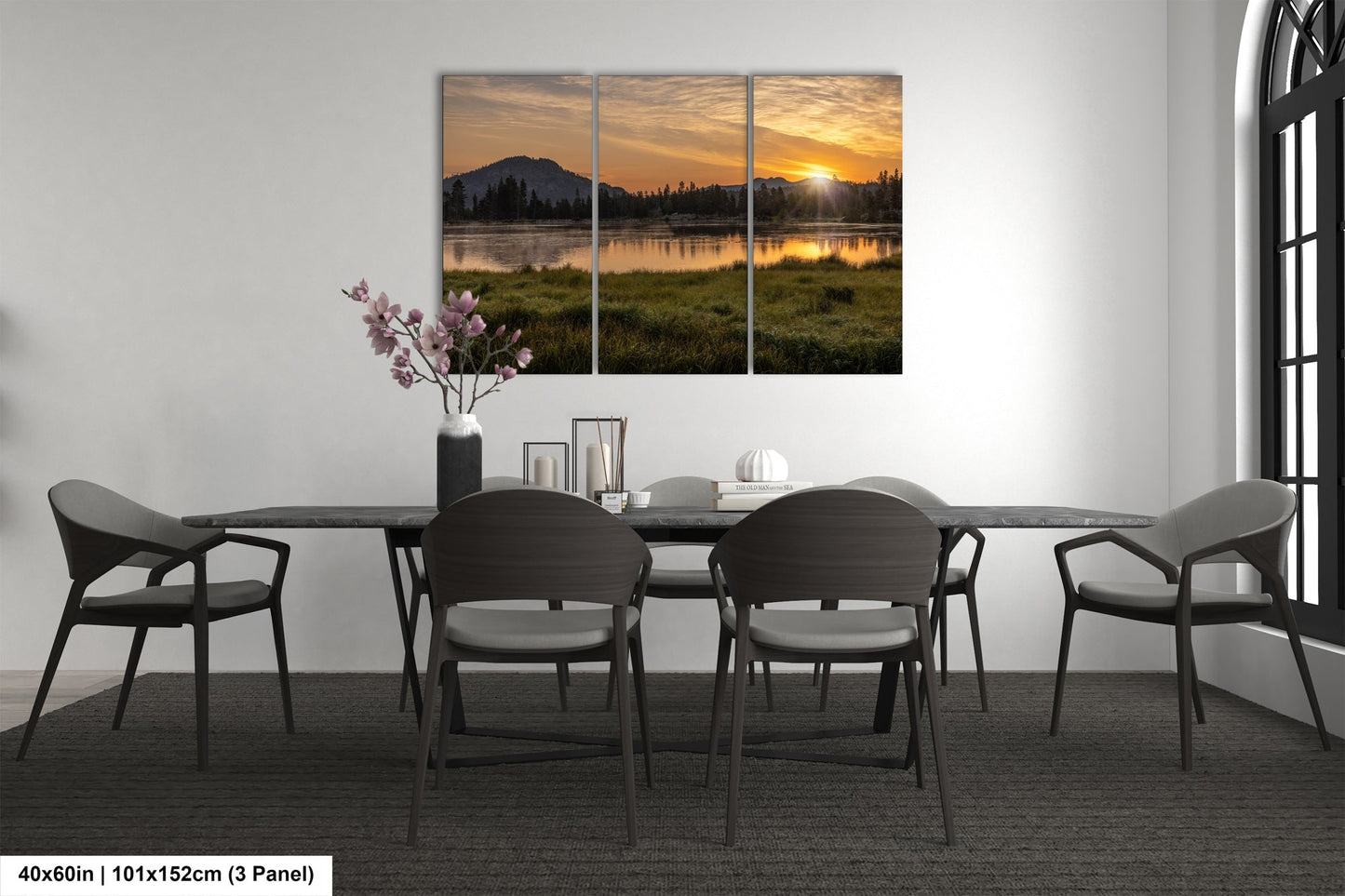 a dining room with a table and chairs