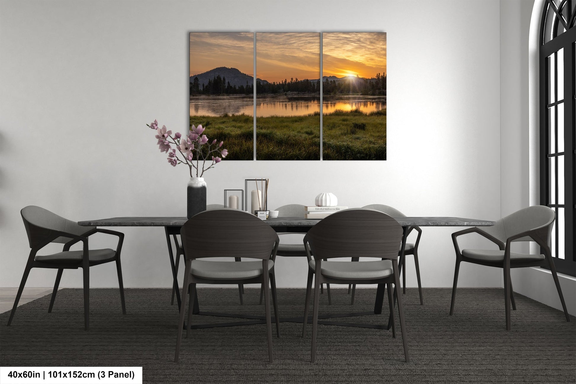 a dining room with a table and chairs