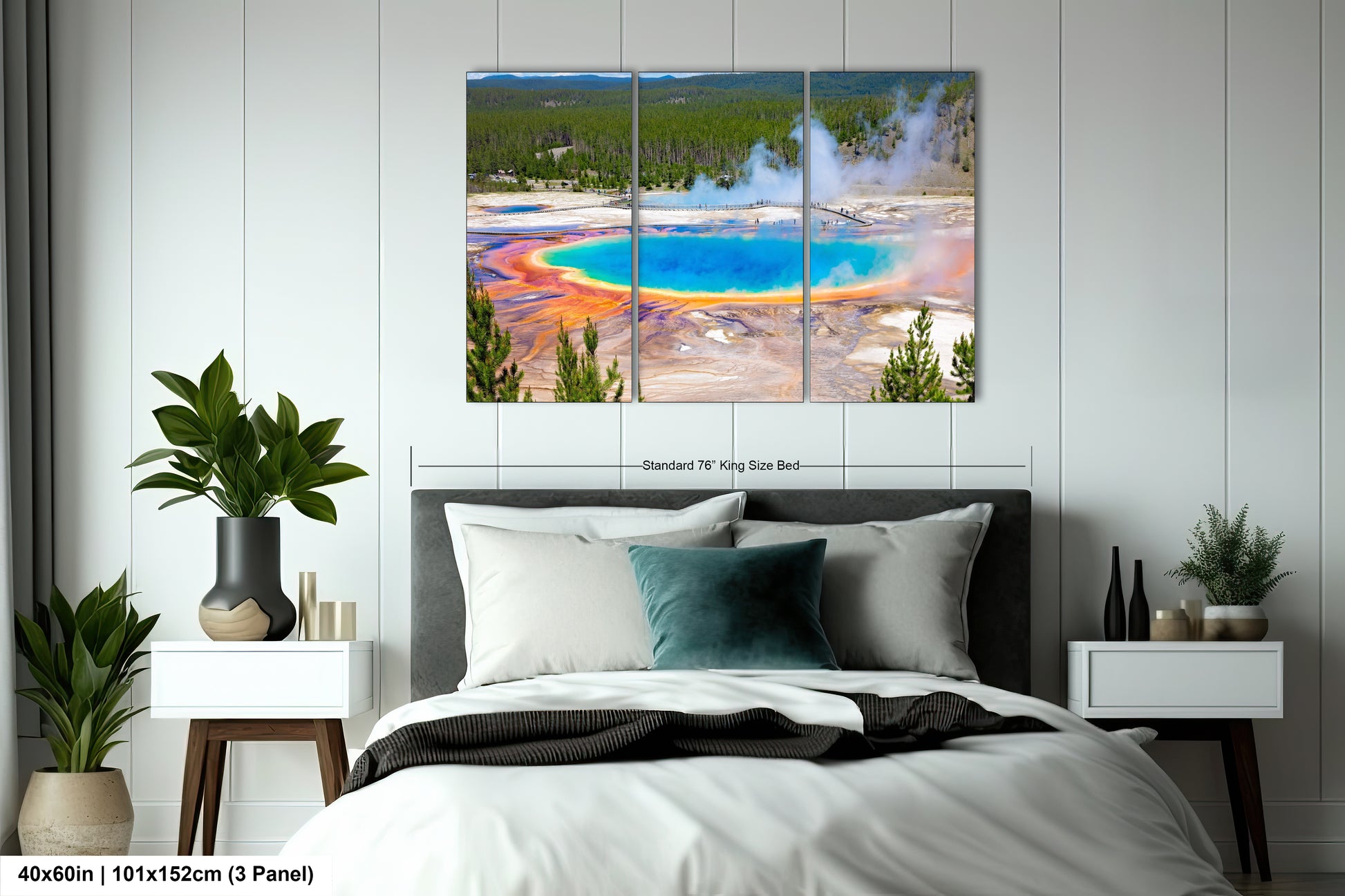 a bedroom with a large bed and a painting on the wall