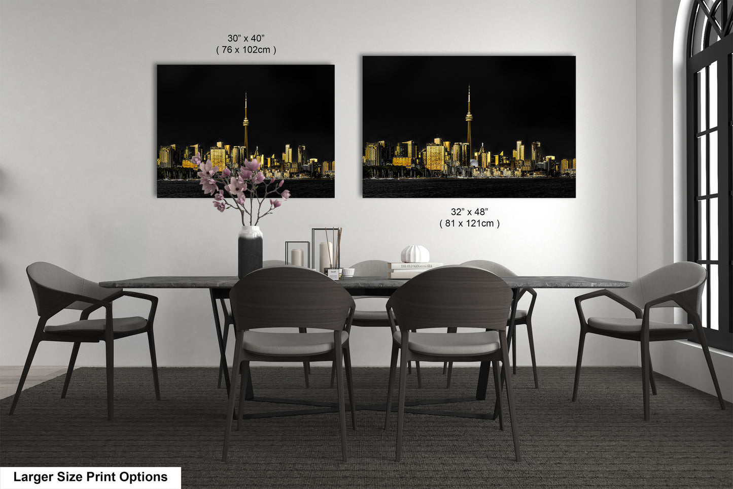 a dining room table with chairs and a vase of flowers